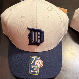 American Needle Cream and Dark Green Cap